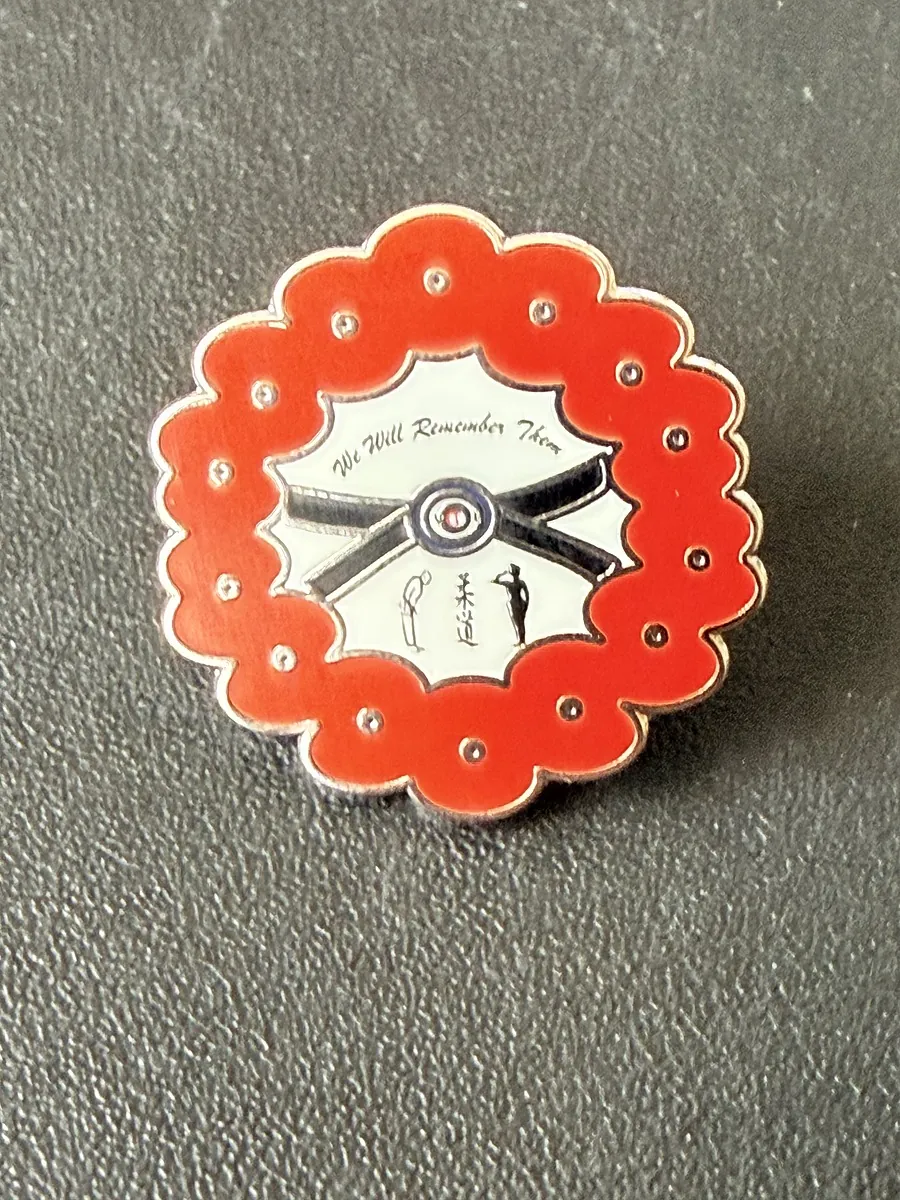 Red poppy wreath 'We Will Remember Them' cloisonné badge with printed centre