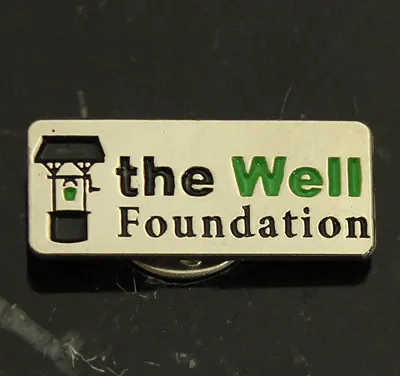 The Well Foundation logo enamel pin badge in nickel